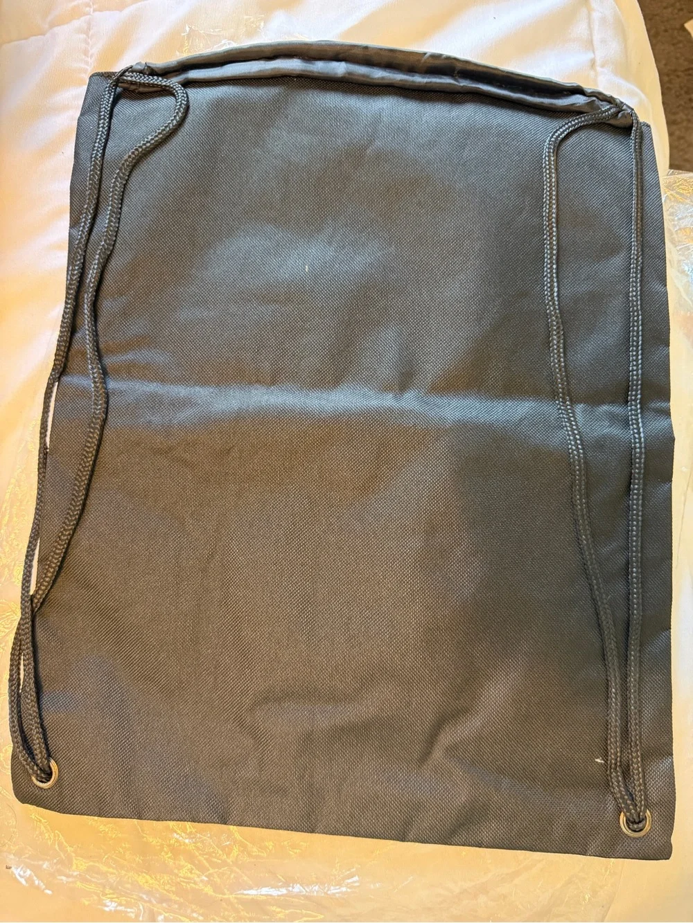 Universal Black/Green Drawstring Backpack with Front Zipper Pocket, Unisex